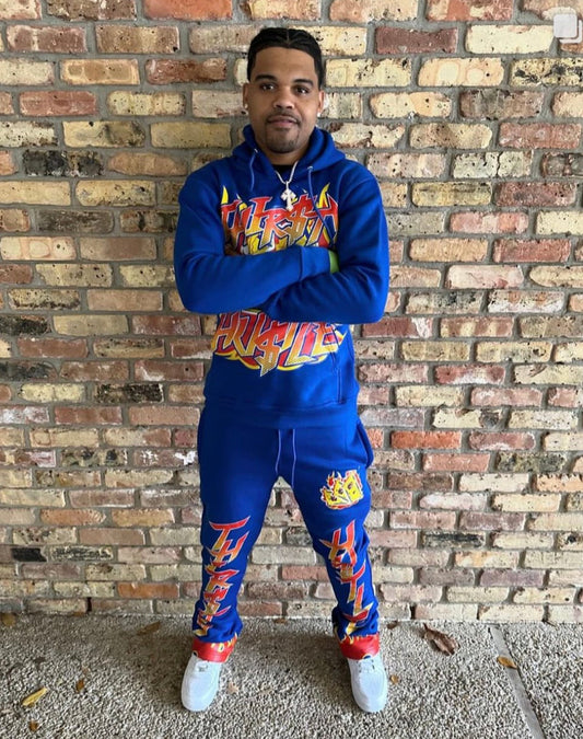 @og_3three Wearing The Blue "In TH$ We Trust Sweatsuit